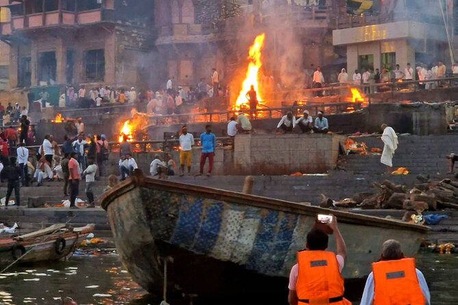 Delhi to Varanasi: Tour to the Sacred Ganga Aarti Ceremony - A respectful visit to Manikarnika Ghat
