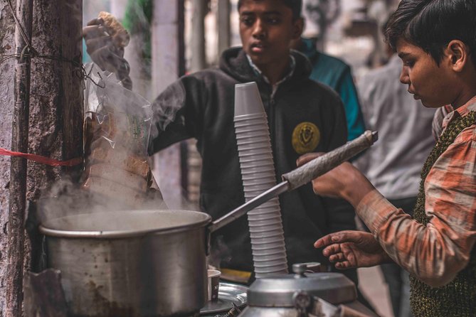 Guided 3‑hour rickshaw ride through Old Delhi with transfers - Chandni Chowk, the route’s busiest stretch
