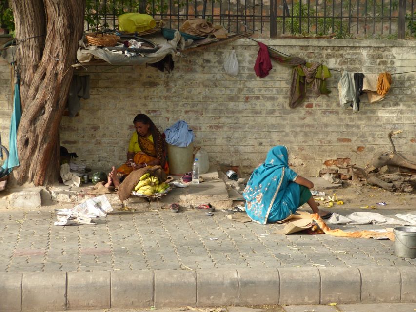 Half Day Slum Walking Tour Delhi - Walking through a working neighborhood