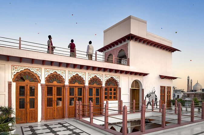 The Old Delhi Sundowner - Kite Flying and High Tea - The illuminated skyline at the end