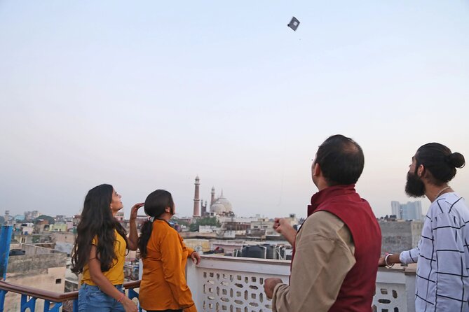 The Old Delhi Sundowner - Kite Flying and High Tea - A rooftop view with four historic directions