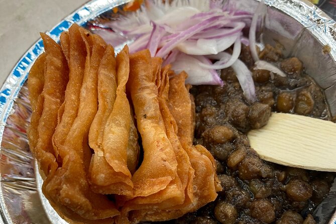 Unlock Delhi's Secrets: Food and Photography Full Day Tour - Starting among the shutters and spice stalls of Chandni Chowk
