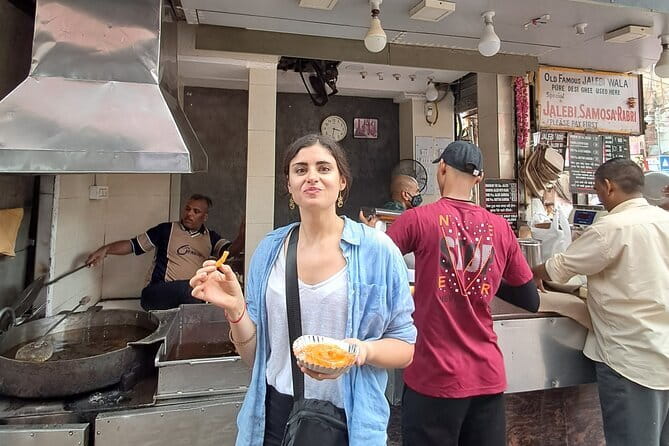 Unveil Old Delhi's Food, Spice Market & Heritage Walk - Getting around by foot, tuk tuk, and public transport